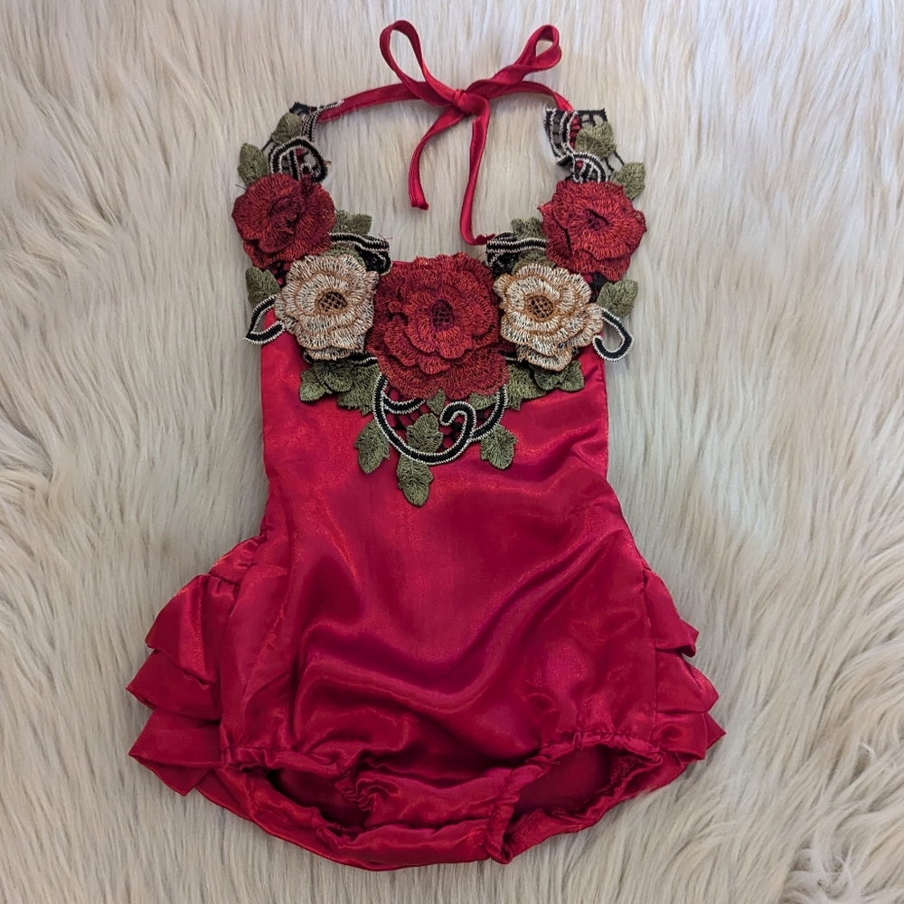 Red halter top silky open back body suit with floral aplica size 6-9